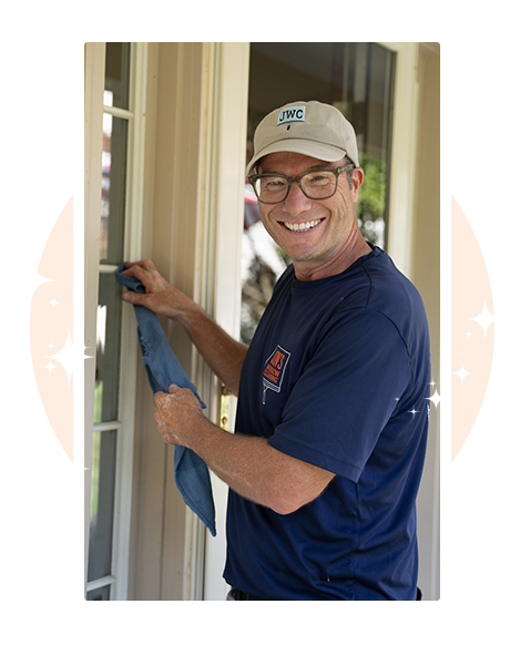 Jon, owner of Jon’s Window Cleaning in Downingtown PA, professionally cleaning residential windows with traditional squeegee method